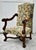 Vintage (1950's) High Back Arm Chair has a Renaissance Revival Style. The Frame is Wood. Carved Wood. Tapestry Like...