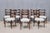 This exceptional set of eight dining chairs was designed by Paolo Buffa and made in Italy from the late 1940s. They are...