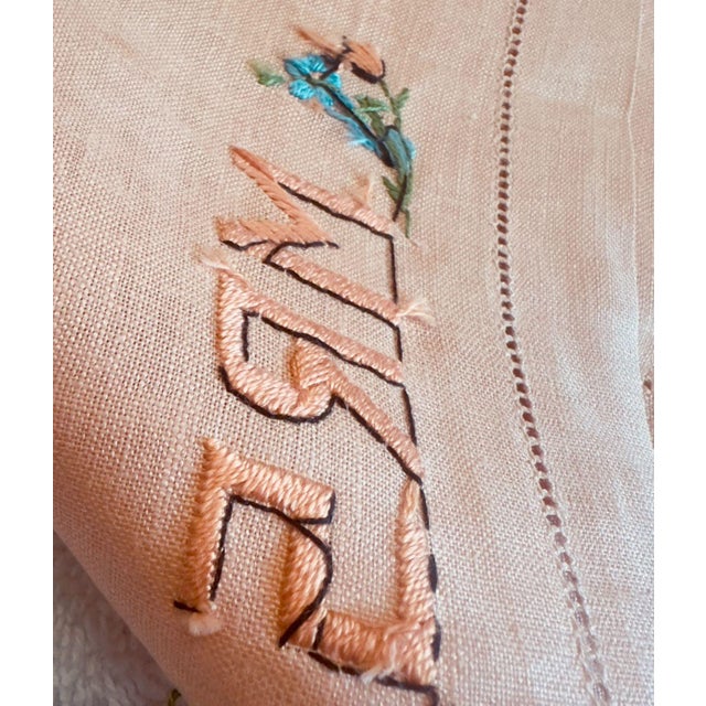 A charming pair of vintage embroidered linen towels, delicately stitched with “Mr” and “Mrs” in a soft blush-toned thread,...