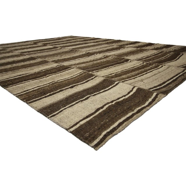 60638 Vintage Turkish Kilim Rug with Earth-Tone Colors, 08'09 x 11'02. Wabi-Sabi embraces rustic finesse in this handwoven...
