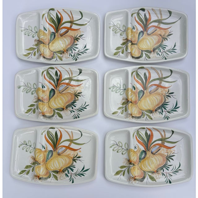 Celebrate the warmth of Italian craftsmanship with this beautiful set of six vintage hand-painted divided plates by...