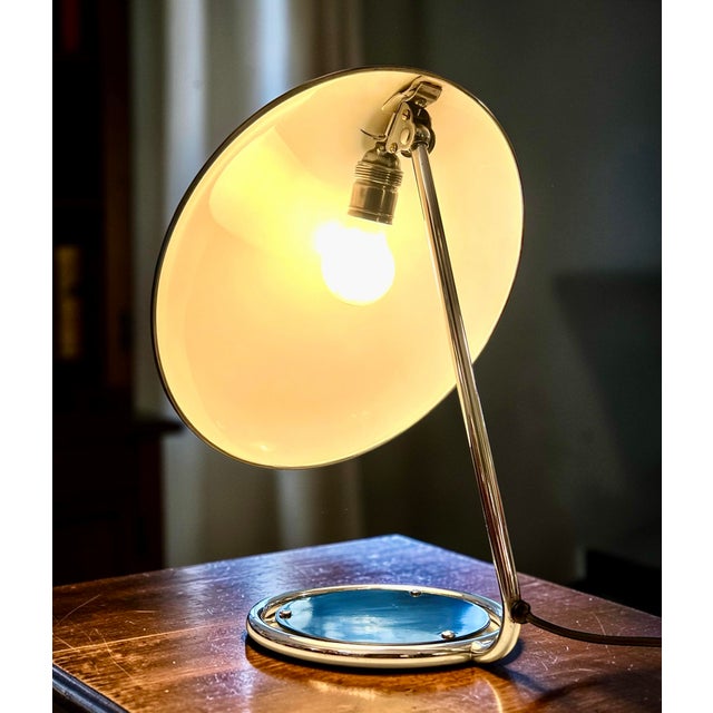 A stunning original bauhaus table lamp by the world-renowned lighting designer christian dell, model 6761 for kaiser...