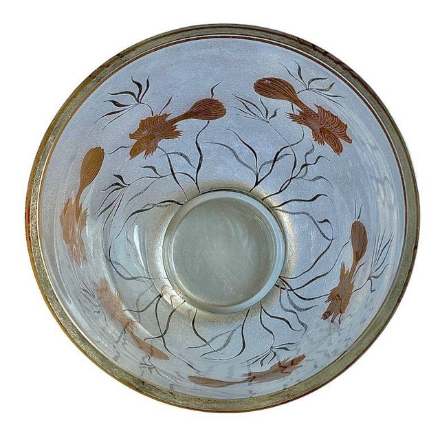 The artistry and design of this piece are truly stunning. Featuring a clear glass body with intricate texturing,...