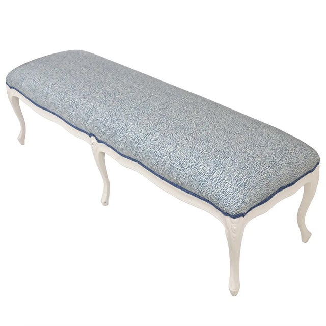 This Louis XV-style newly upholstered bench features elegant curved legs and a graceful design characteristic of the...