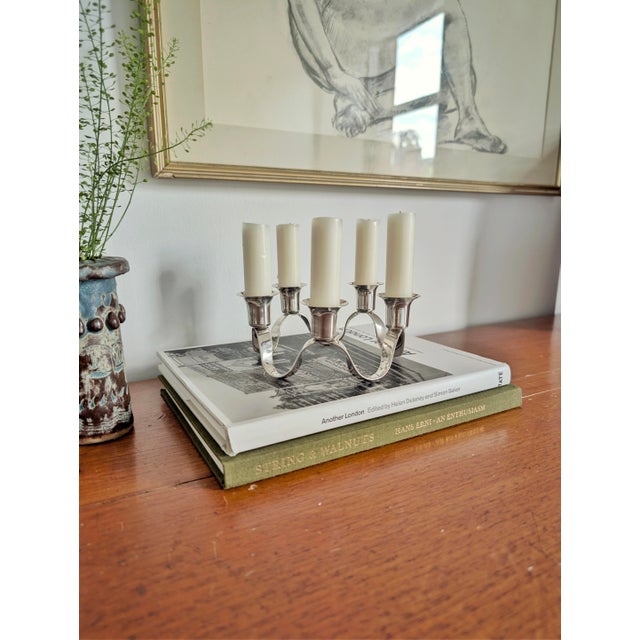 An antique silver plated circular waveform candleholder by silversmith Charles Wright (active circa 1775-1786). A...