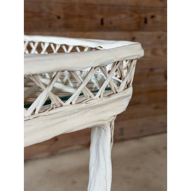 A classic vintage bar cart designed by Russell Woodard, featuring the iconic spun fiberglass lattice construction that...