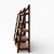 Pair of Mid-Century Wood and Woven Rush Etageres. A sculptural pair of tall open display shelves combining angular wooden...