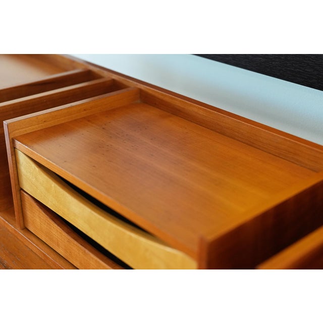 An exceptionally well-crafted Danish modern teak desk organizer by Pedersen & Hansen, showcasing the refined simplicity...