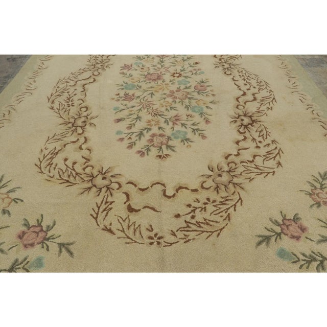 This 10x14 antique hooked rug is an elegant new addition to Rug & Kilim’s Antique collection—a rare and fascinating folk-...