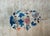 A beautiful early 20th century Chinese Feti rug with a gray field surrounded by a thin orange stripe a wide indigo stripe,...
