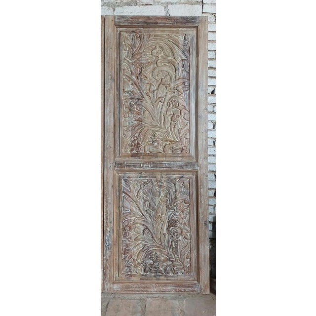 These vintage double barn doors feature beautifully artistic floral carvings, hand-carved into solid wood with exceptional...