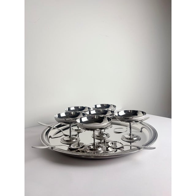 Contents & Dimensions • 6 dessert coupes, H 7.5 cm × Ø 9 cm • 5 matching spoons, 14.5 cm ( 1 spoon is missing) • Serving...
