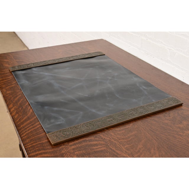 A gorgeous pair of Art Deco or Arts & Crafts period bronze blotter ends featuring symbols of the Zodiac, with a custom...