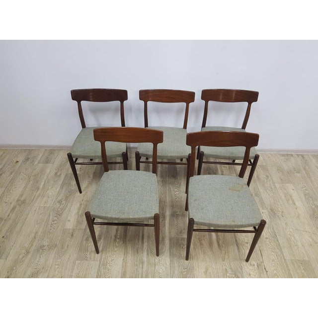 An impressive set of five teak chairs, manufactured in Germany in the 1950s and 1960s. Lübke model 603 designed by Gustav...