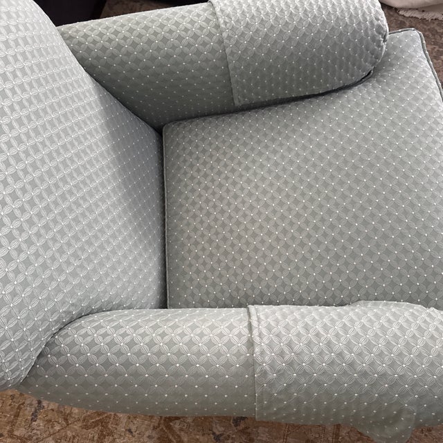 An exceptional, factory-custom order vintage Ethan Allen swivel rocking club lounge chair and matching skirted ottoman...