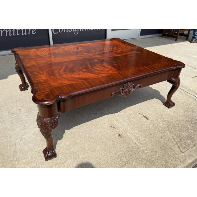 The Henkel Harris Georgian Cocktail Table Model No. 5250W is a substantial mahogany table featuring a beautifully figured...
