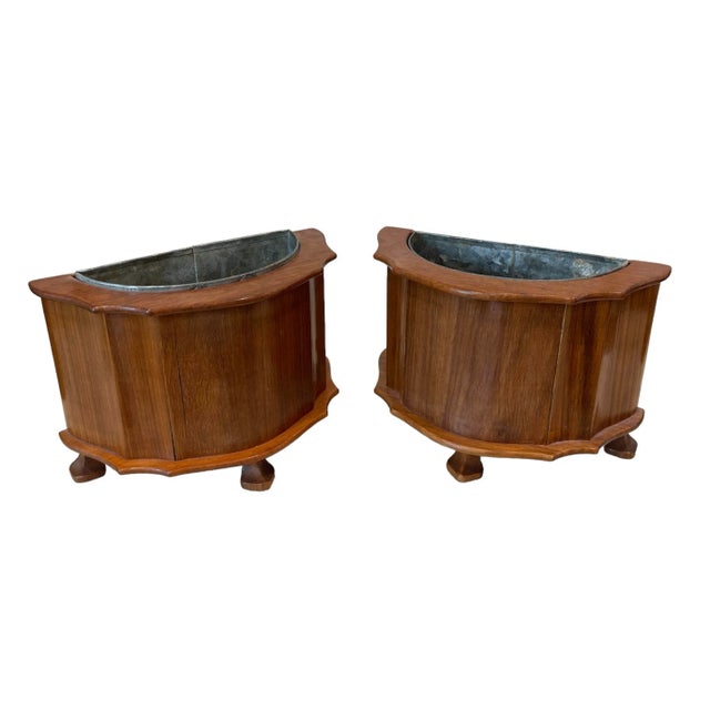 English carved pair of tabletop planters with metal liners. They rest on carved feet. Half moon shape, nice in a mantle....