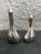 Amorphic shaped silver plated salt & pepper shakers. The bottom of each shaker is stamped “MADE IN HONG KONG E.P.N.S”. The...