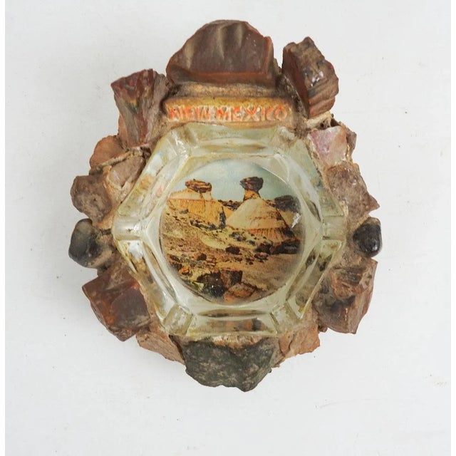 Vintage mid 20th century New Mexico souvenir ashtray. Glass ashtray with various rocks, jasper and agate around the edge,...