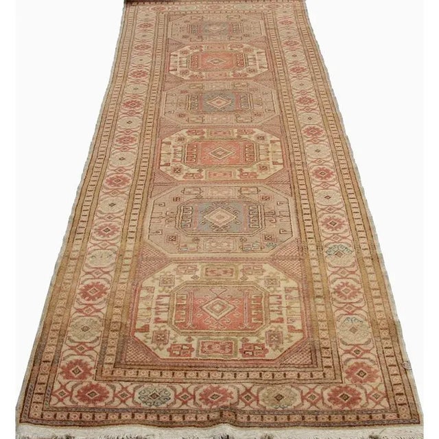 ACTUAL SIZE: 3’1″ x 9’6″ PRIMARY COLOR: Brown / Tan AGE: Old ORIGIN: Turkey MATERIALS: Wool FOUNDATION: Cotton PRODUCTION:...