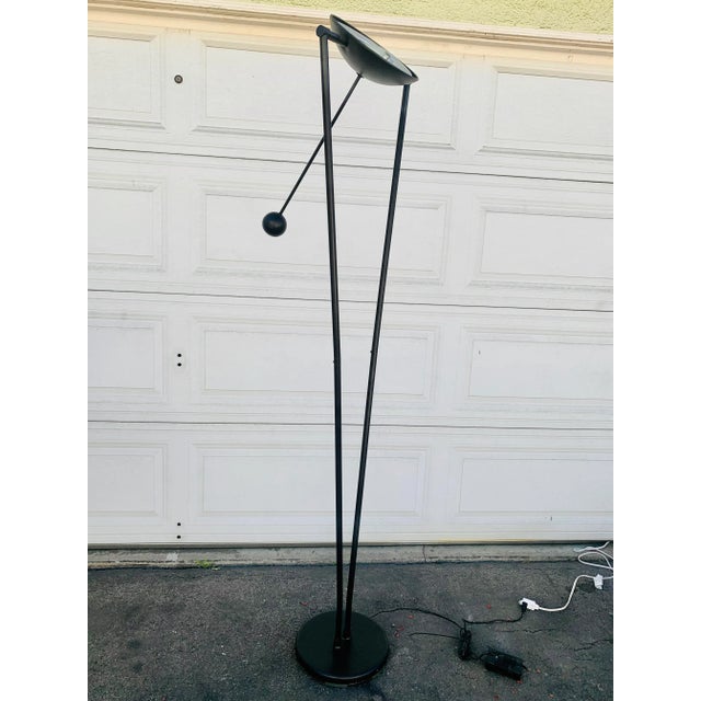 For sale a very unique Postmodern Pendulum floor lamp. The lamp swings to desired light direction. Very cool in great...