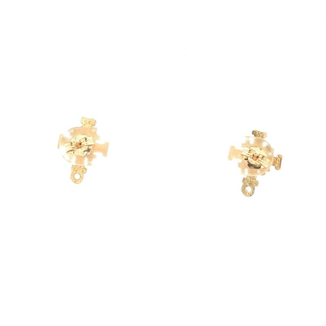 A pair of contemporary 14k gold cross stud earrings. In good condition. They are 0.5 inches in height.