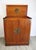 An authentic 1960s George Zee & Co. expanding dry bar cabinet, crafted in richly figured teak with brass corner mounts,...