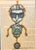 Whimsical yet direct folk art painting on a French book page, mounted on board, and newly-matted and framed under gallery...