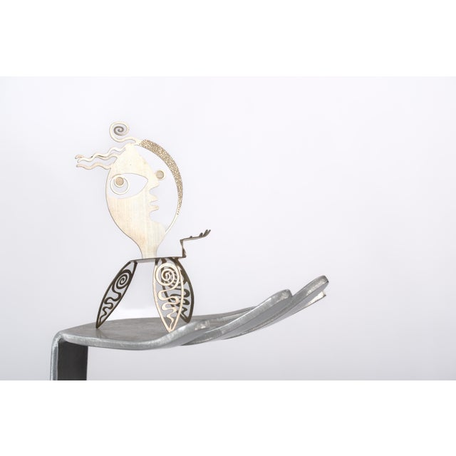 A striking piece of sculptural art furniture — the "Cubist Girl" chair by Christopher Royal for Rockledge Design Studio,...
