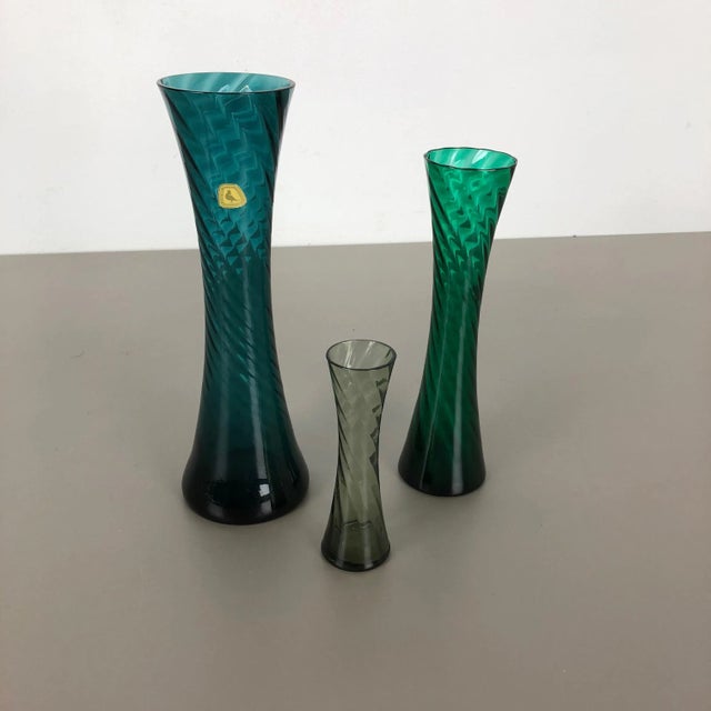 Article: Set of three crystal vases Producer: Alfred Taube Kristall Glasfabrik, Germany Decade: 1960s These original...