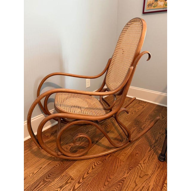 Vintage, signed Thonet, Bentwood Rocker. A classic for a reason, this bentwood rocker does not disappoint. An authentic...