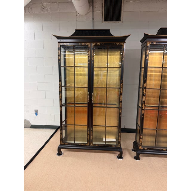 Touted as the preeminent cabinet maker of the day, 1960's Union National Chinoiserie China Cabinets were the best money...