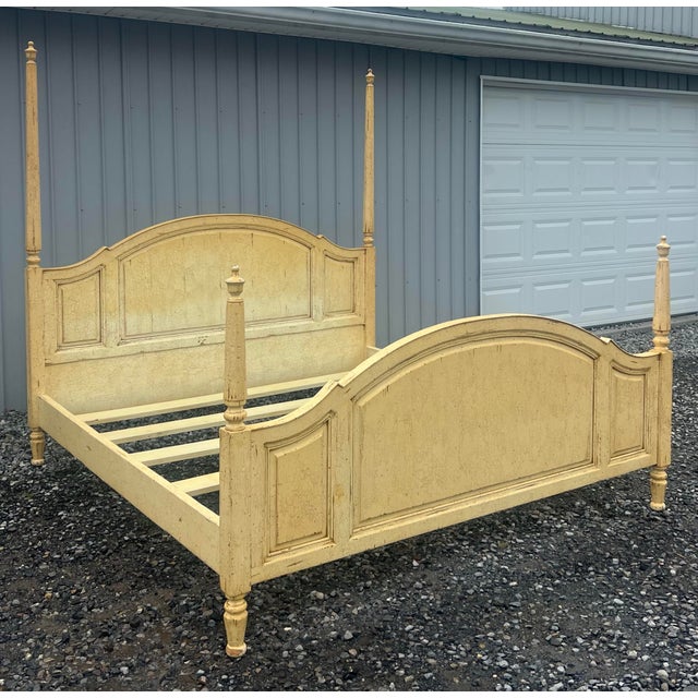 Shabby Chic buttercream king size bed by Guy Chaddock from their Melrose Collection. The tall turned and tapered posts...