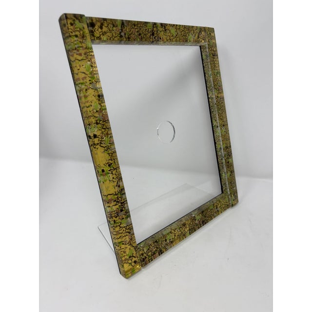 Beautiful Murano Glass picture frame. Brand new. Created by one of the top Artists in Murano. Measures 11" x 9".
