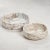 A striking bowl centerpiece designed for modern elegance. Crafted from premium marble, its distinctive veining and classic...