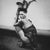 Black Opium by Dasha and Mari A flapper fashioned women crouches nude, 2021. Limited edition print (edition size 1/30)...