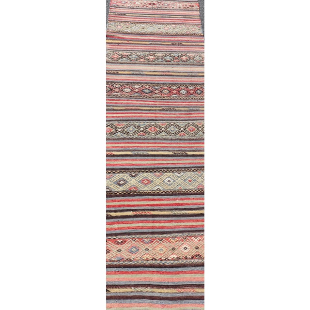 Hand woven vintage Turkish Kilim in colors with hand woven motifs with stripes in various tones. Rug TU-NED-5047, country...