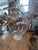 Vintage lucite hanging bubble chair in the style of Eero Aarnio. The hanging chair is a fun clear acrylic sphere suspended...