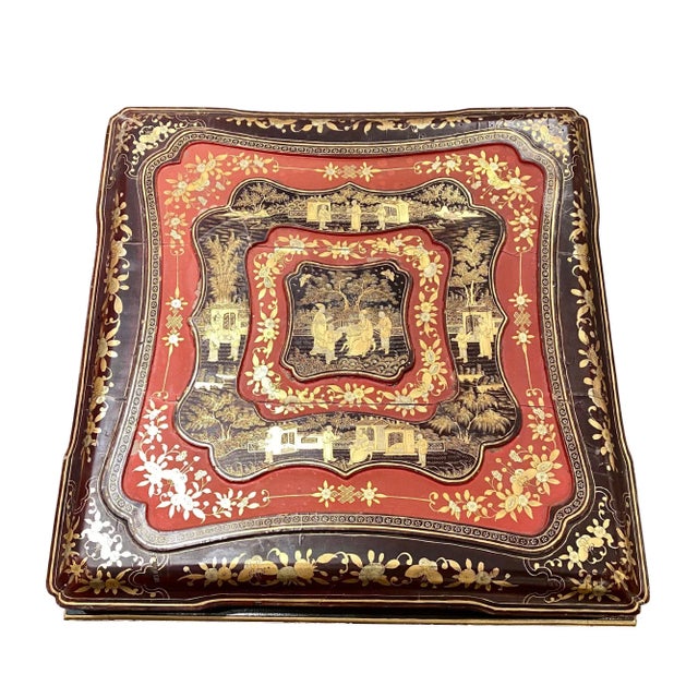 A fine and rare 19th Century China Trade lacquer box on later stand. The shallow square box with an undulating top surface...