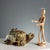 Hard stone sculpture depicting a mother turtle with her baby on her back. This piece is attributed to the mentioned...