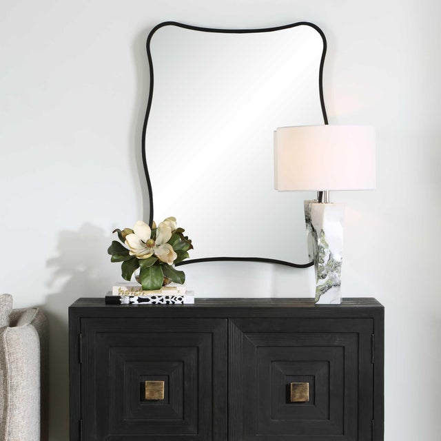 This Curvy Vanity Mirror Features A Shaped Iron Frame Finished In A Sleek Satin Black. May Be Hung Horizontal Or Vertical....