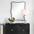 This Curvy Vanity Mirror Features A Shaped Iron Frame Finished In A Sleek Satin Black. May Be Hung Horizontal Or Vertical....