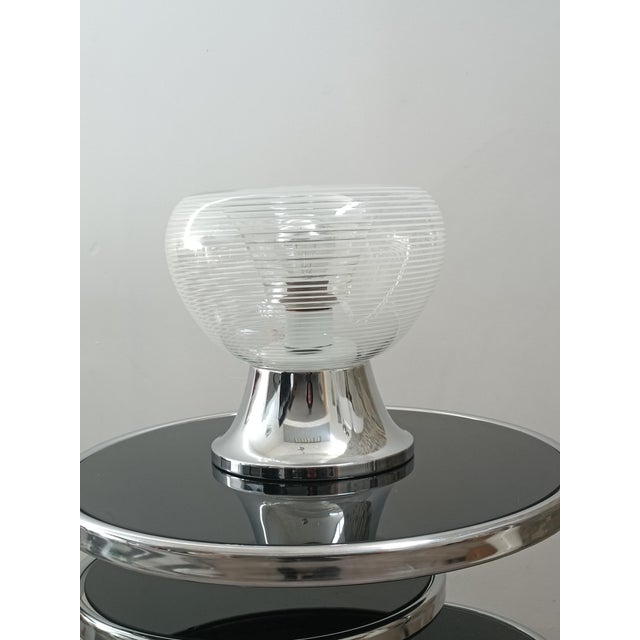 Beautiful table lamp by VeArt. Italy, 1970s. Impressive Murano glass globe, clear and striated with fine white lines....