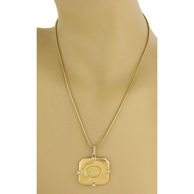 This beautiful pendant and chain is from designer Seidengang, crafted from 18k yellow gold. The pendant featuring a...