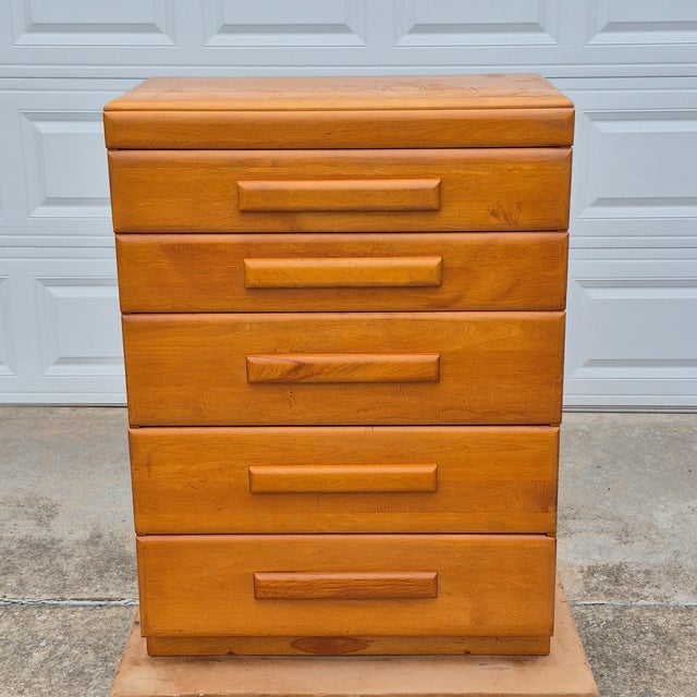 This is an early modernist maple dresser designed by Russel Wright for Conant Ball in the 1930s. From the late 1920s...