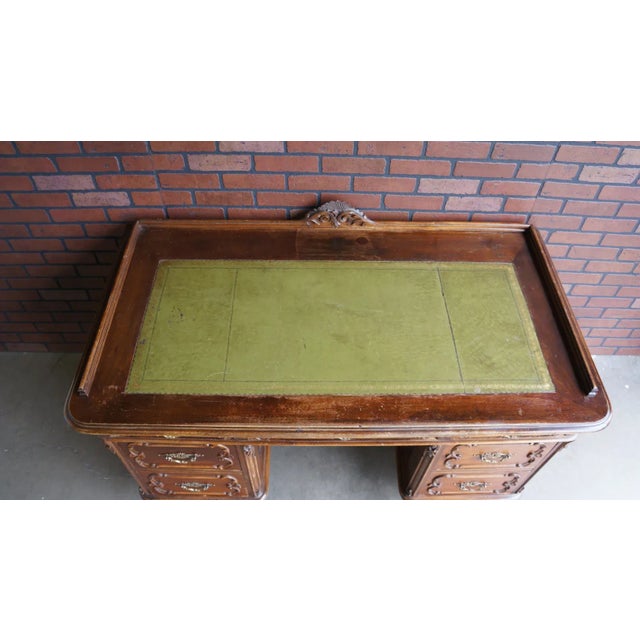 Austrian antique desk, estimated to be from the late 1800's or early 1900's. Incredible carved drawer details and...