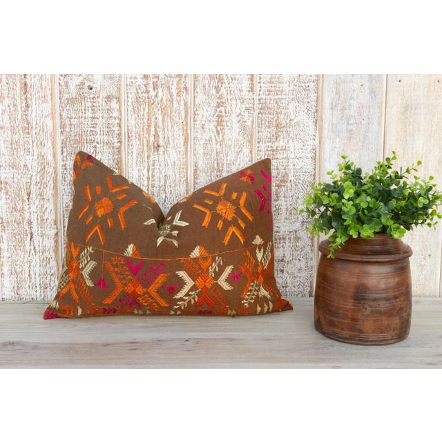 This colorful and luxurious Bagh Phulkari pillow features beautiful hand-done silk embroidery on top of a cotton fabric....