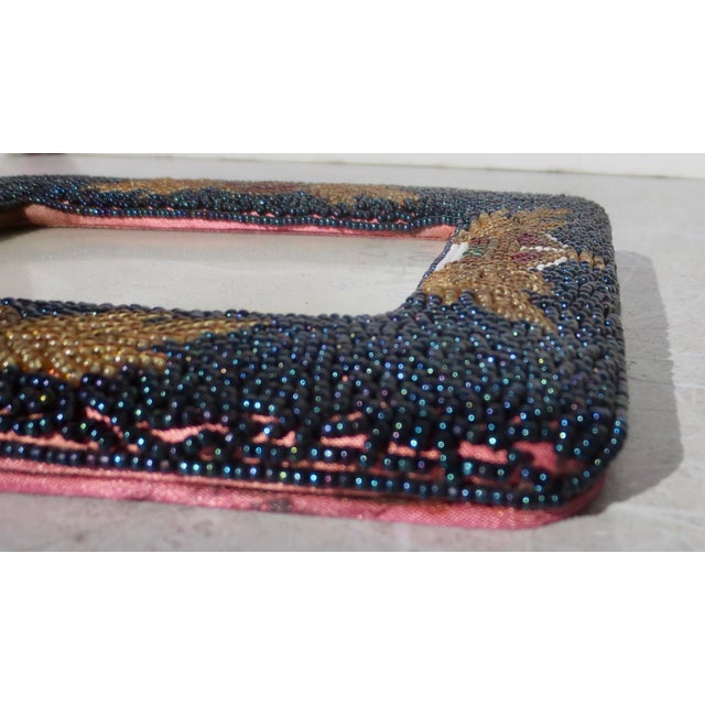 Lovely beaded frame with satin lining and deep blue iridescent bugle beads, the pattern is medallions of Anchors flanked...