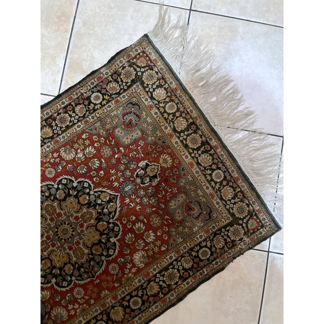 This exquisite handmade silk rug from India, dating back to the 1970s, showcases the fine craftsmanship and luxurious...