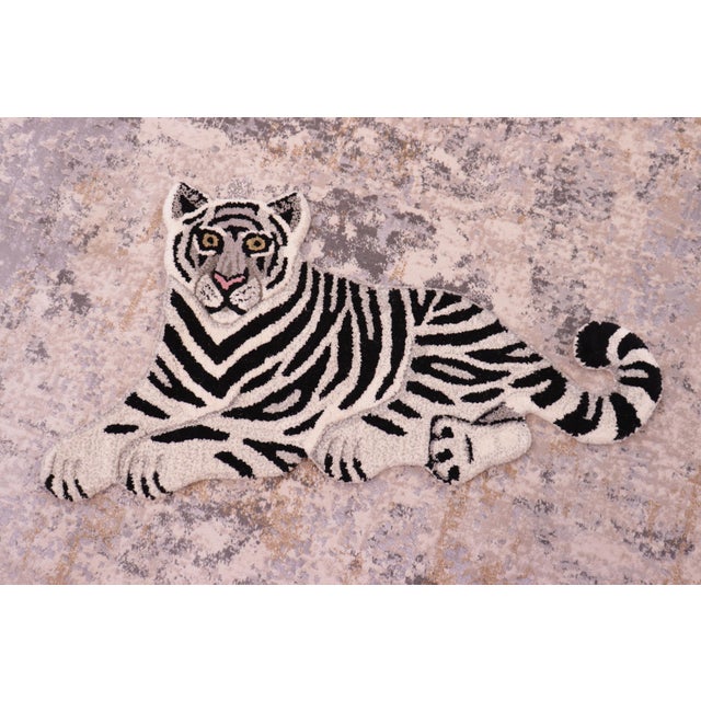 Indulge yourself in the unique beauty and timeless style of this handmade exotic animal print rug. Define any space and...